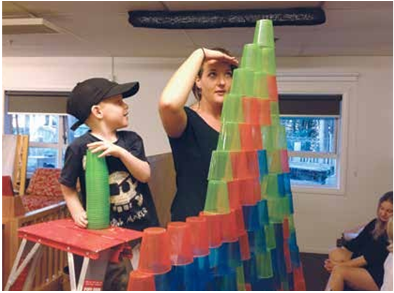 Boy constructing design
